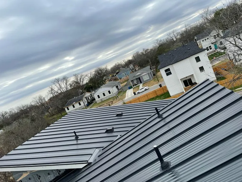 Standing seam metal roof panels with vents for Skylight Repair in Berlin